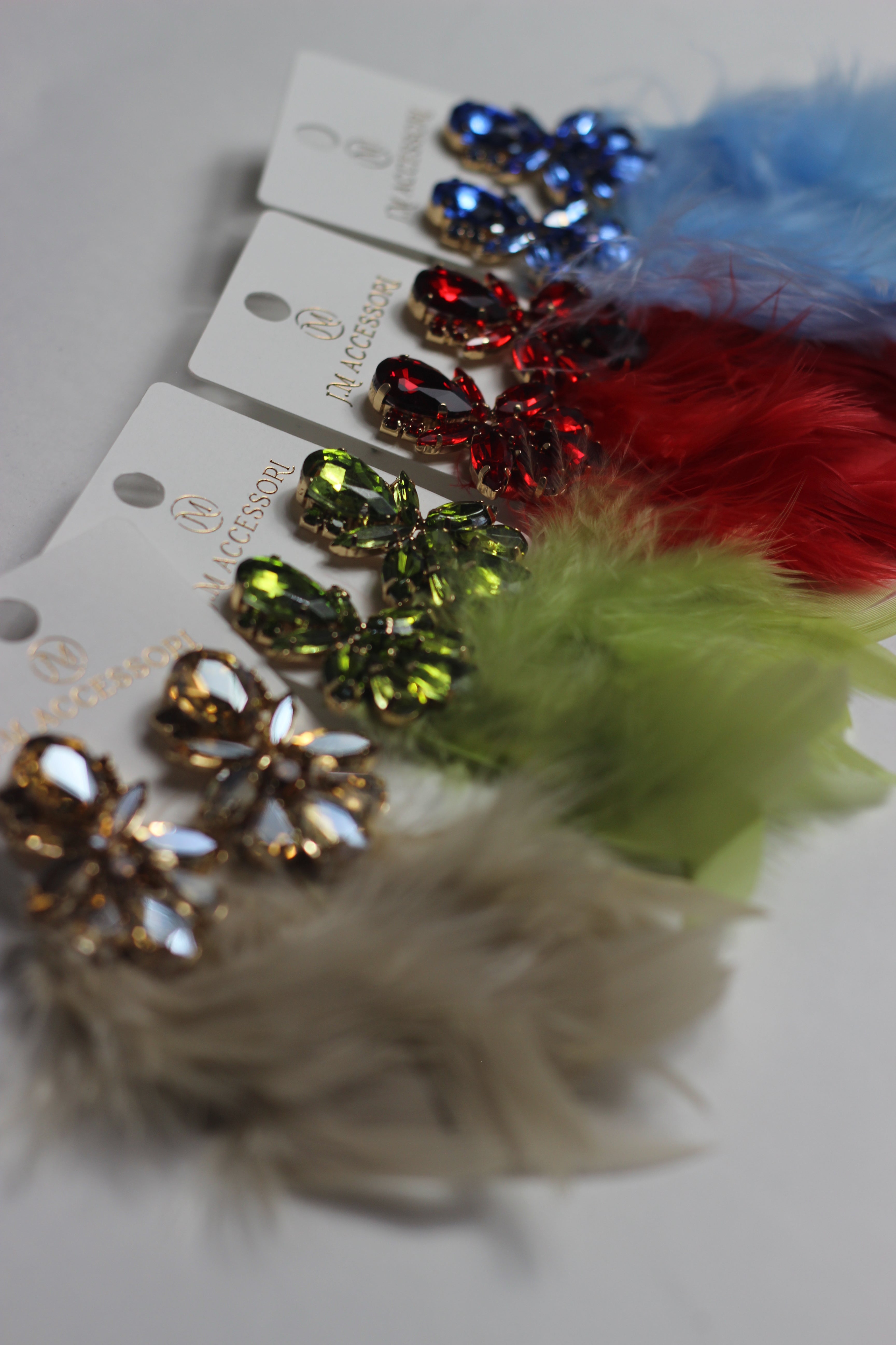 Orecchini piuma vari colori